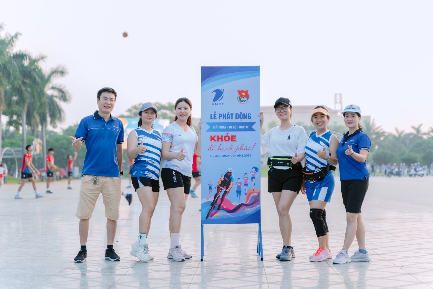 Description: A group of people posing for a photo
Description automatically generated