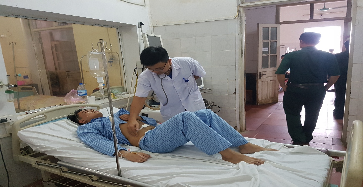 A person lying on a bed in a hospital room
AI-generated content may be incorrect.