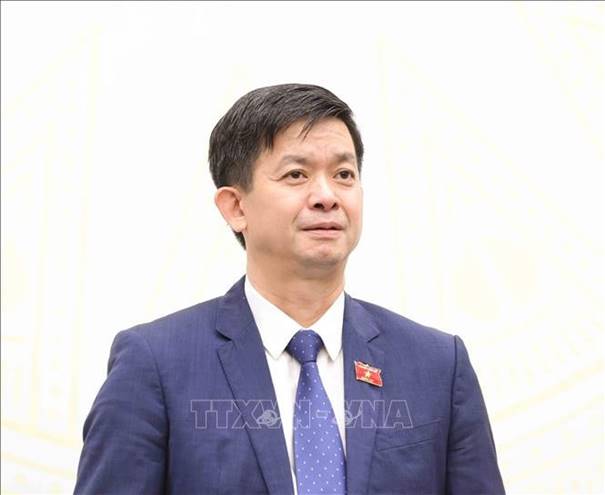 Description: Tổng thư ký, Chủ nhiệm Văn phòng Quốc hội Lê Quang Tùng chủ trì Họp báo. Ảnh: Phương Hoa/TTXVN