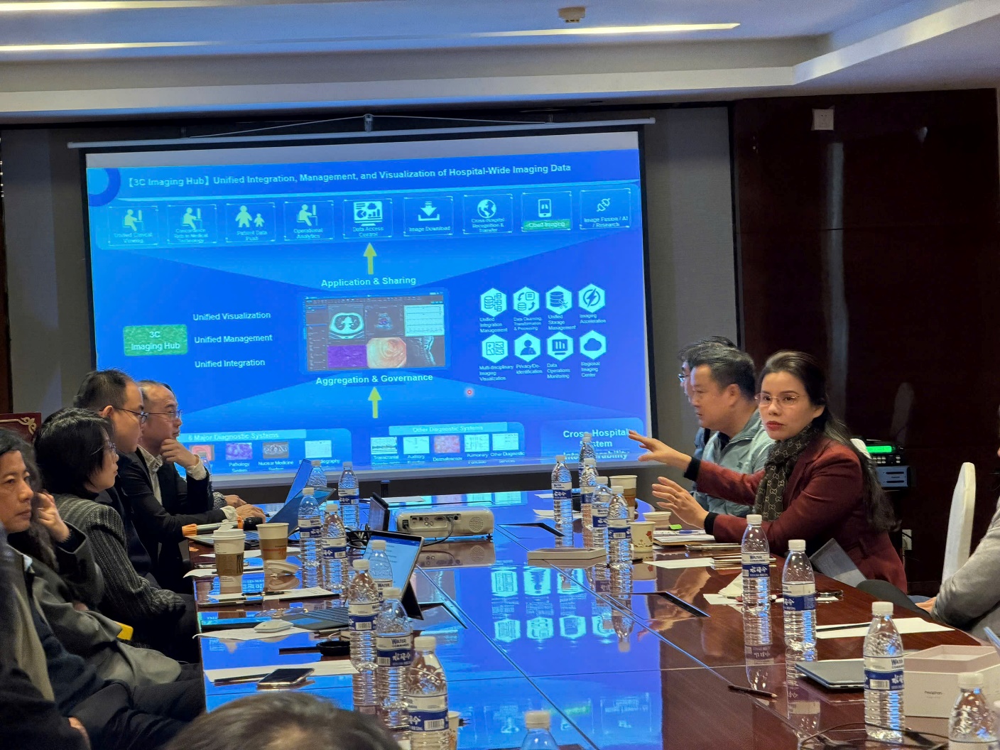 A group of people sitting at a table
AI-generated content may be incorrect.